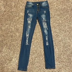 Shein multi button skinny distressed jeans. Super cute. Worn once. Size small.